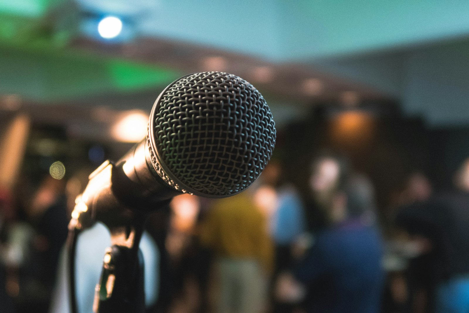 A debater making a point at the microphone