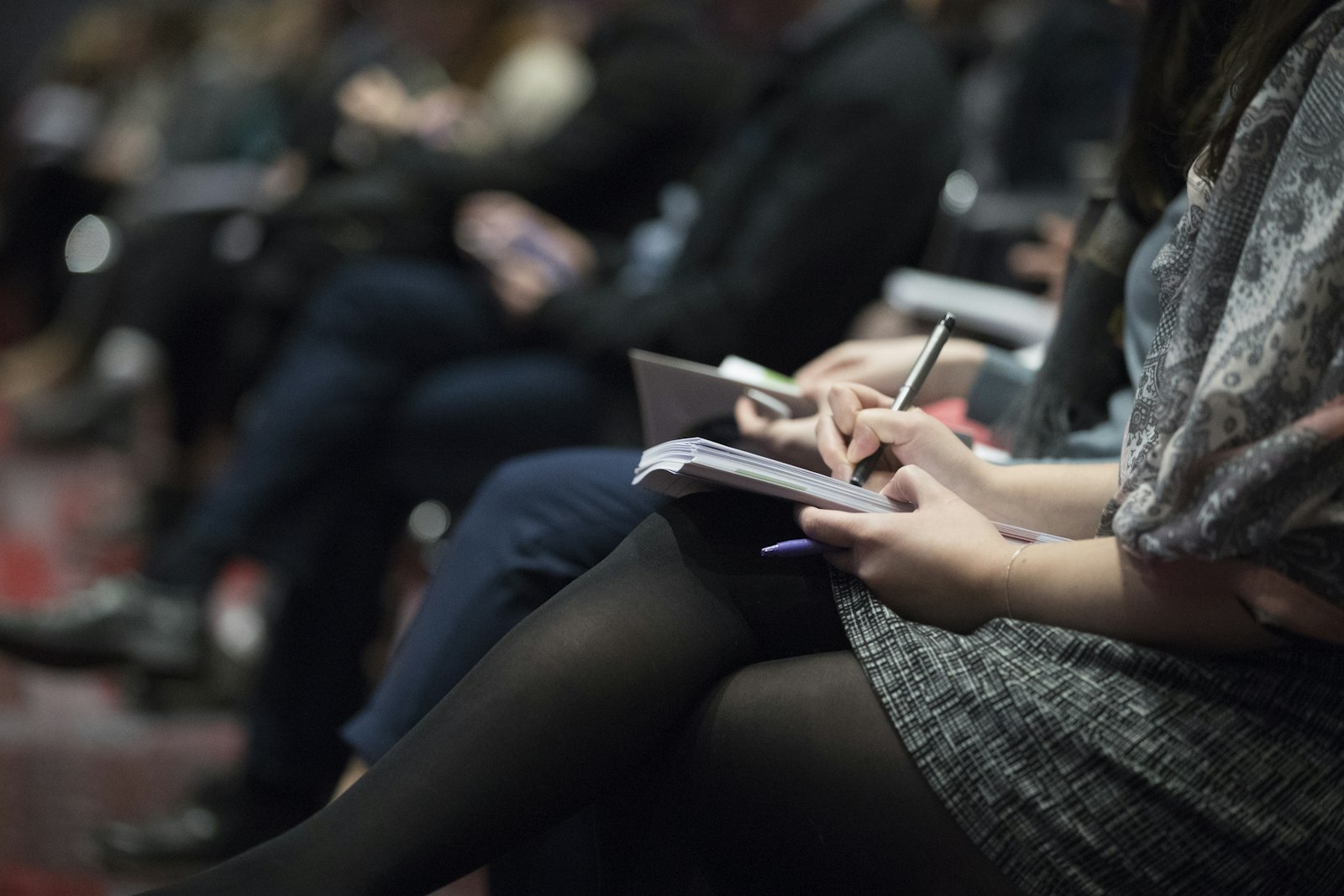A debater preparing notes